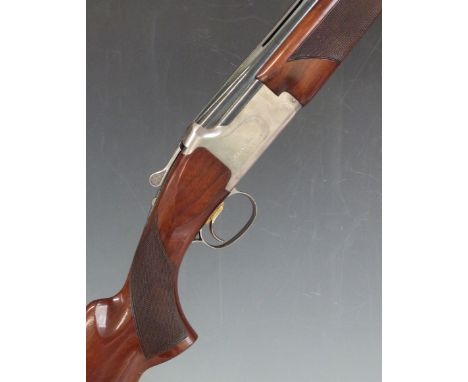 Browning 325 Grade 1 12 bore over and under shotgun with named and engraved locks, chequered semi-pistol grip and forend, ven