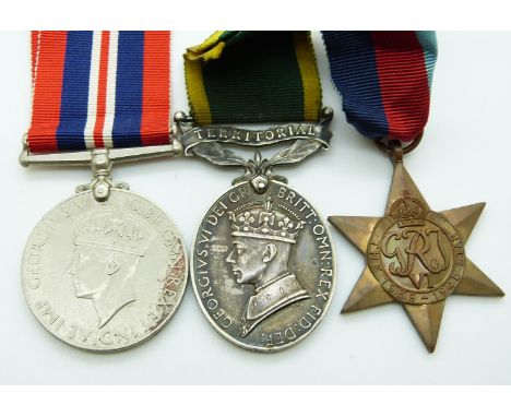 British Army WWII medals comprising 1939/1945 Star, War Medal and Territorial&nbsp;Efficiency Medal named to 4193486 Gunner J