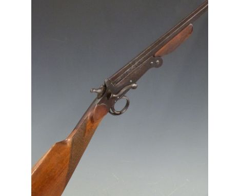 Belgian .410 folding hammer action shotgun with chequered grip and forend and 28 inch part octagonal barrel, overall length 1