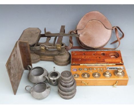 Set of shop or kitchen scales, cased set of weights, leather case and three pieces of Arts and Crafts pewter items