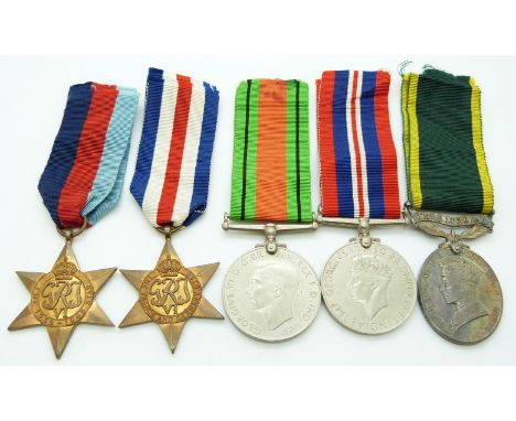 British Army WWII medals comprising 1939/1945 Star, France &amp; Germany Star, Defence Medal, War Medal and Territorial&nbsp;