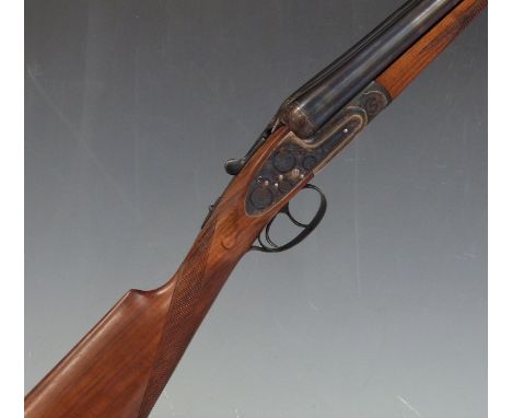 Laurona 12 bore side by side sidelock ejector shotgun with named and engraved lock, engraved trigger guard, underside and top