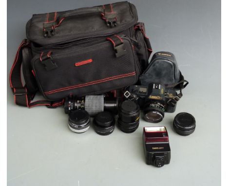 Canon T70 SLR camera with 50mm 1:1.8 and 35-70mm 1:3.5-4.5 lenses, Sigma 70-210 f 4.5 lens, three tele converters etc