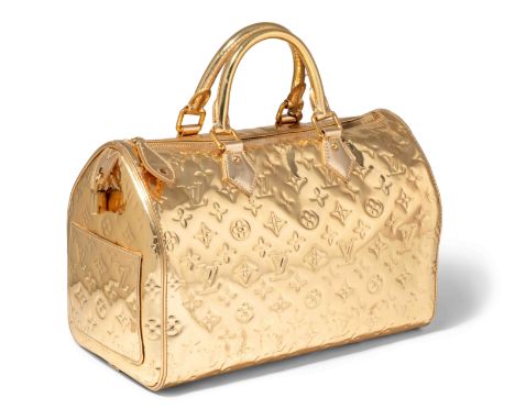Louis Vuitton, Handtasche "Speedy Miroir"2006. Aus beschichtetem, geprägtem, goldfarbenem Monogram Canvas. Zwei abgerundete T