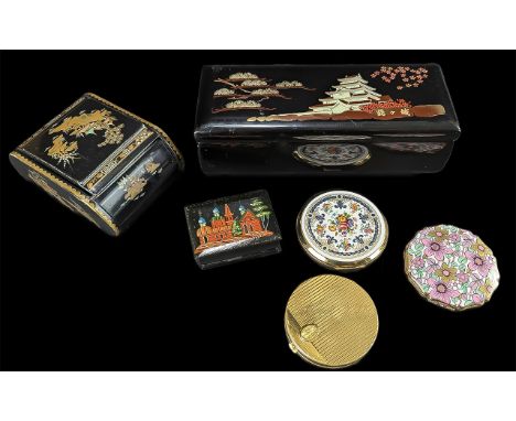Collection of Three Lacquered Boxes, comprising a jewellery box with hinged lid and mirror, 9'' x 3.5'' x 2'', a smaller box 