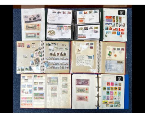 A Collection of 5 Stamp Albums to include various stamps and first day covers. Including various stamps from around the world