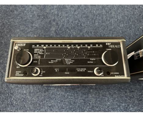 Two Vintage Hacker Herald Radios, finished in black and chrome.