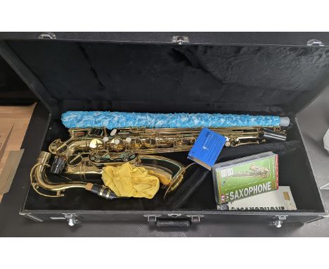 Washington Tenor Saxophone, brass with pearlised buttons, floral engraving, in fitted case.  In excellent condition.  Include