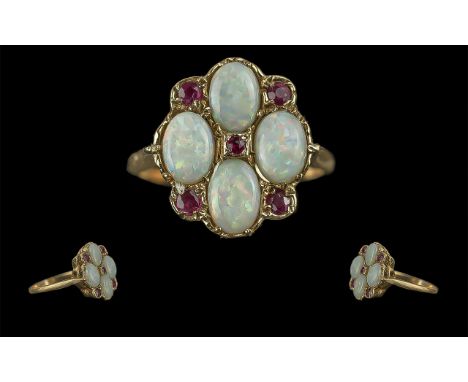 Ladies 9ct Gold Opal and Garnet Set Cluster Ring, Pleasing Setting. Full Hallmark to Interior of Shank. The Well Matched Opal