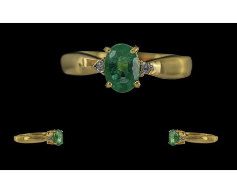 Ladies 18ct Gold Pleasing Quality Emerald and Diamond Set Ring. Full Hallmark to Interior of Shank. The Oval Shaped Faceted E