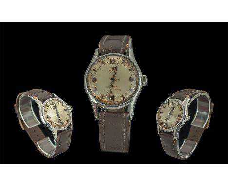 Vintage Gentleman's Zenith Pilot Wristwatch, Swiss made, No. 8465951, leather strap, baton and Arabic numerals, working at ti