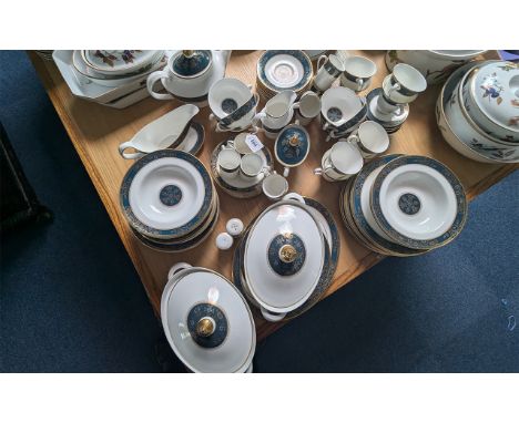Royal Doulton 'Carlyle' Dinner Service including milk jug, sugar bowl, eight cups, saucers, and sides, sandwich plates, salad
