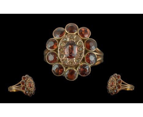 Ladies 9ct Rose Gold Orange Topaz and Seed Pearl Set Cluster Ring. Tests 9ct Gold. Ring Size R. Weight 4,4 grams.