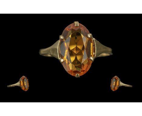 Ladies - Pleasing 9ct Gold Single Stone Citrine Set Ring. Marked 9ct to Shank. The Oval Shaped Faceted Citrine of Strong Colo