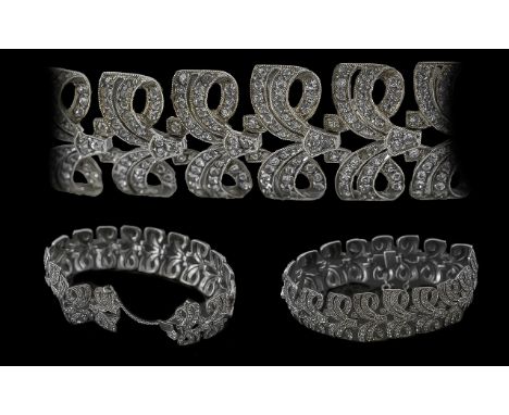 Vintage Silver Bracelet set with small crystal stones, in original box.  Pretty delicate design.