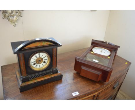A two hole mantel clock together with a Quartz Westminster chime wall clock