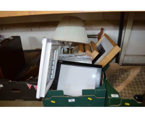 A box of various pictures; picture frames; a table lamp etc