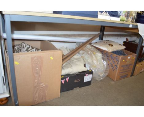 Three boxes and a bag of various curtains and cushions