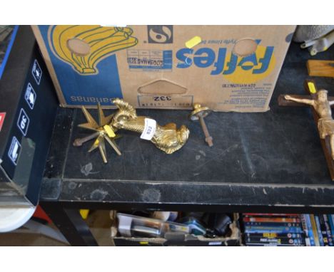 A brass door knocker