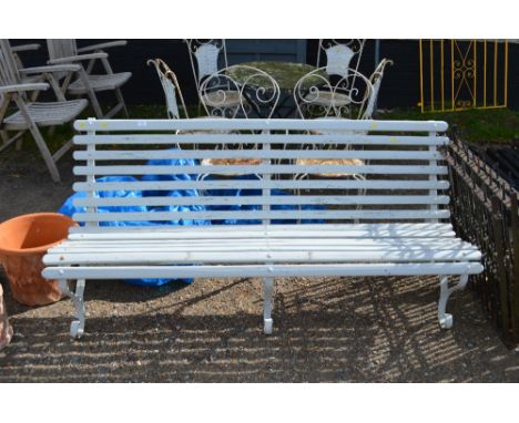 A wooden and metal garden bench