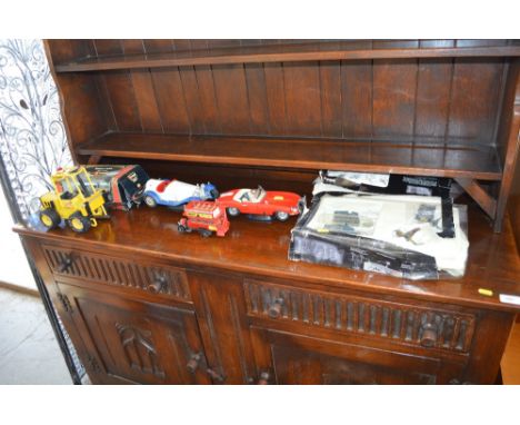 A quantity of die-cast toys to include Tonka fork lift and Corgi spitfire etc. 