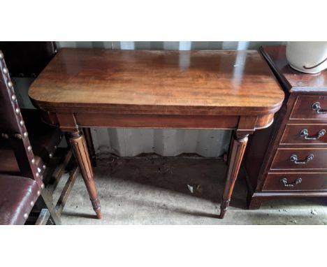 A 19th century mahogany fold over card table having a green baize and on turned tapering legs, 74.5cm h x 91.5cm wLocation: R