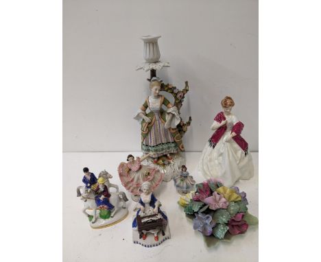 A group of late 19th century and later Continental figures to include a classical figure of a lady fashioned as a candlestick