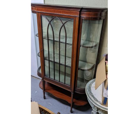 An Edwardian mahogany display cabinet having a single door box wood inlaid and shelf below 170 H x 115 WLocation: GRIf there 