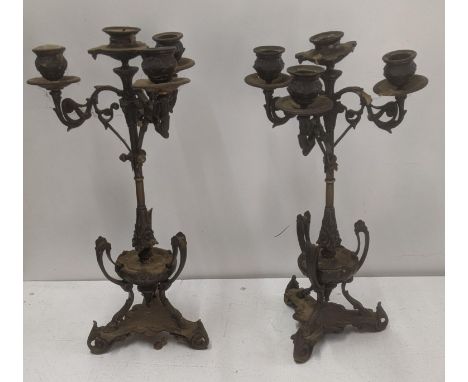 A pair of French bronze circa 1900 candelabra with ornate scroll arms, on a ornate tripos bases A/F, 36cm highLocation: 10.1I