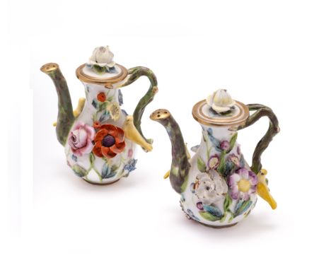 A PAIR OF SPODE MINIATURE ROSEWATER SPRINKLERS AND COVERS, 1820s each applied in high relief with yellow birds and flowers, o