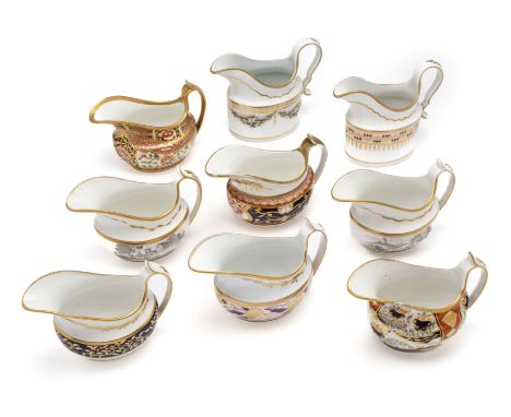 A GROUP OF NINE SPODE MILK JUGS, CIRCA 1810 all oval, various patterns including three Imari pattern jugs and two bat printed