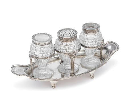 A GEORGE III SILVER INKSTAND, JOHN ROBINS, LONDON, 1813 shaped oval frame with reeded rim, on panel feet, supporting three pe