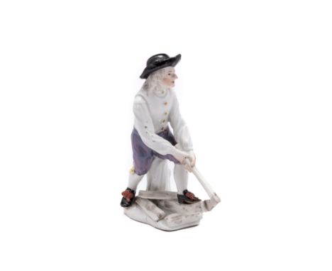 ‡ A MEISSEN FIGURE OF A WOODCUTTER, CIRCA 1745-50 modelled by Johann Joachim Kändler (1706-1775) as a farmer in white shirt a