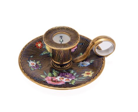 A SPODE CHAMBERSTICK, CIRCA 1820 painted in pattern '2478' with flowers against a deep blue and gilt striped ground, red pain