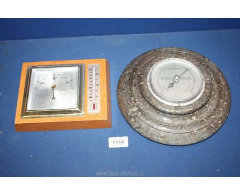 A marble Barometer and a wooden framed Barometer/thermometer with winter and summer readings.