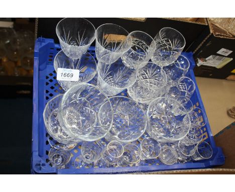 A quantity of glass including 4 matching wine glasses, 4 sundae dishes, various liquor glasses etc.