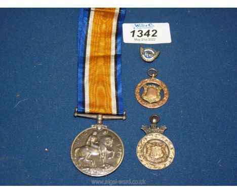 A 1914-1918 War medal with ribbon to 'M21223 Arthur Watson, ACT-ERA.4 RN' (Acting Engine Room Artificer 4th class), a silver 