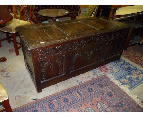 A fine old three panelled peg-joyned Blanket Chest, having blind fretworked frieze, and arch and pendant motifs, complete wit