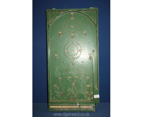 An old Bagatelle board with scoreboard and balls (spring absent), a/f.