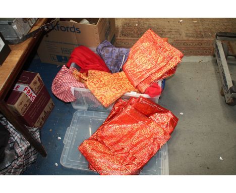 A quantity of red and orange textiles including satin damask brocade, possibly from The Spanish Princess series 2 but with no