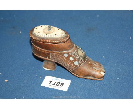 A small wooden carved Snuff box in the form of tribal sandal shoe with bone lid and soles and mother of pearl inlay (sole of 