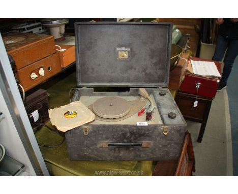 A His Master's Voice record player in brown case, a/f 12'' x 17 1/2'' x 9'' deep.