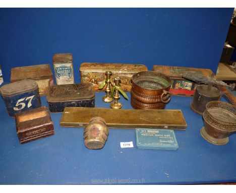 A quantity of miscellanea to include Jack Daniels and Cow &amp; Gate old tins, a pair of small brass candlesticks, an old mon