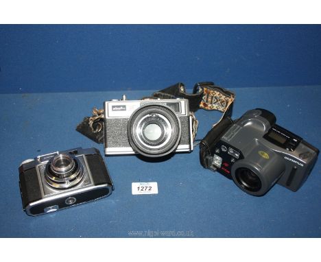 Three cased cameras to include; Olympus AZ-300 Super Zoom, Minolta Super Circuit 3 Hi-Matic 11, Zeiss Ikon Contina Prontor SV