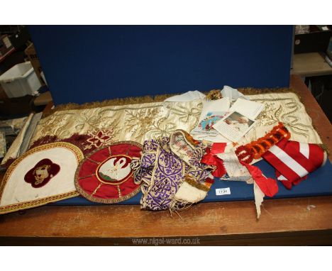 A small quantity of religious textiles, motives, banners, cream and gilt wall hanging and a letter to The Archbishop of Alask