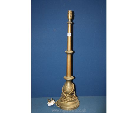 A brass table lamp 27" tall.