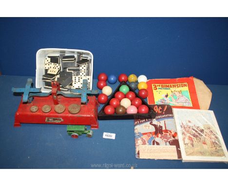 A quantity of games including dominoes, tin plate toy scales, pool balls, Lesney road roller etc.