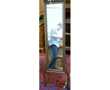 A moulded oak framed easel three quarter length cheval mirror 