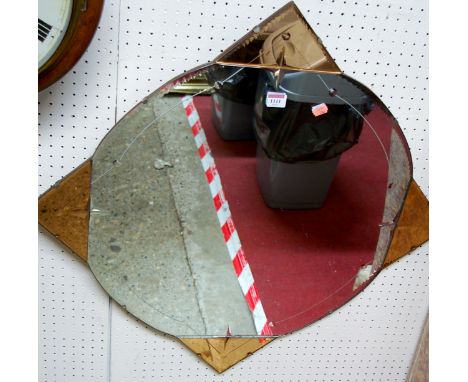 An Art Deco engraved wall mirror having peach glass protruding corner insets