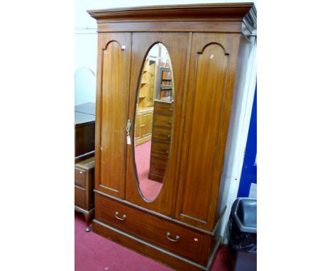 An Edwardian mahogany and satinwood inlaid single mirror door wardrobe having single long lower drawer, width 130cm